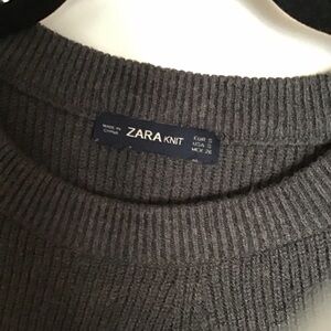 Zara women’s heavy knit gray sweater. Very warm sets around your lower waist.